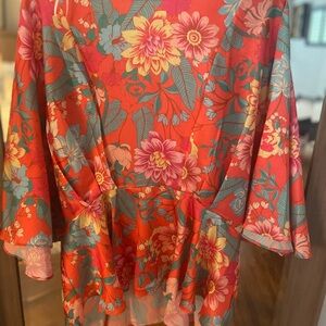 Adorable pull over satin top. Loaded with color. Butterfly sleeves.